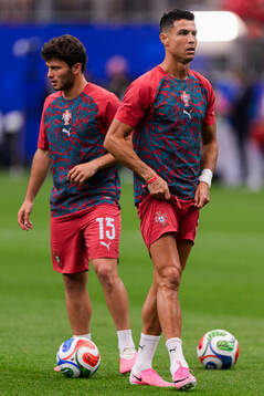 Joao Neves and Cristiano Ronaldo of Portugal