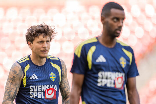 Victor Nilsson Lindelöf and Alexander Isak of the Swedish