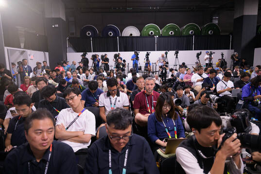 Media at a press conference with Head coach Hajime Moriyasu