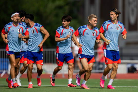 Yuto Nagatomo, Ritsu Doan and Kou Itakura of the Japanese