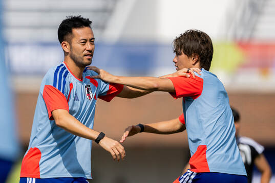 Maya Yoshida and Koki Ogawa of the Japanese national