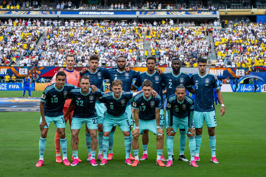 The starting eleven of Germany poses for a photo