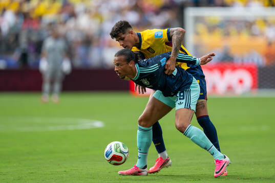 Piero Hincapie of Ecuador and Leroy Sane of Germany