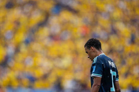Jamal Musiala of Germany looks dejected