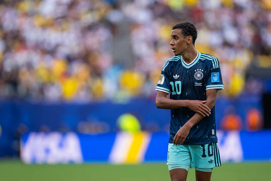 Jamal Musiala of Germany looks dejected