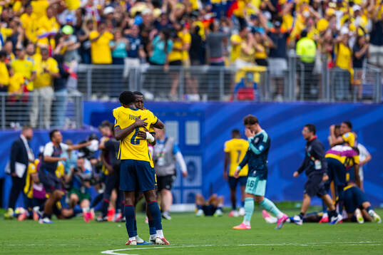 Felix Torres and Willian Pacho of Ecuador celebrate