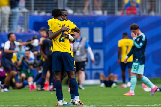 Felix Torres and Willian Pacho of Ecuador celebrate