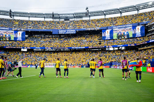 Players of Ecuador celebrate