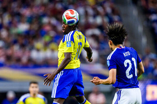 Anthony Elanga of Sweden and Hiroki Ito of Japan