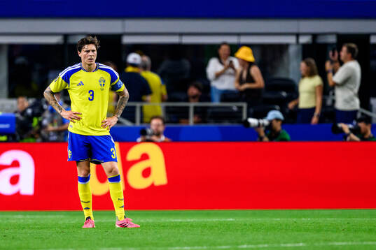 Victor Nilsson Lindelöf of Sweden looks dejected
