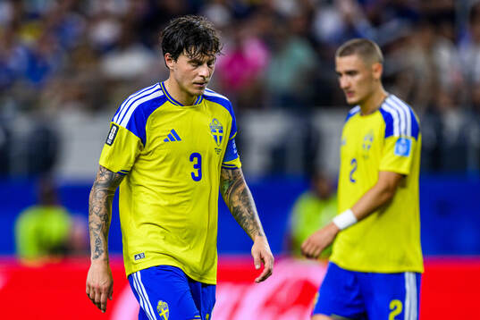 Victor Nilsson Lindelöf of Sweden looks dejected