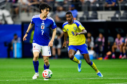 Ao Tanaka of Japan and Alexander Isak of Sweden