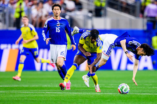 Anthony Elanga of Sweden and Ao Tanaka of Japan
