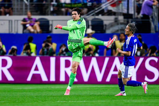Goalkeeper Jacob Widell Zetterström of Sweden and Ritsu