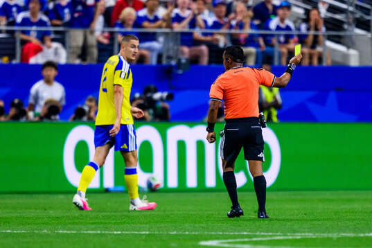Isak Hien of Sweden revives a yellow card from  referee