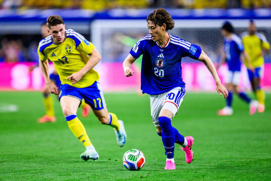 Viktor Gyökeres of Sweden and Ayumu Seko of Japan