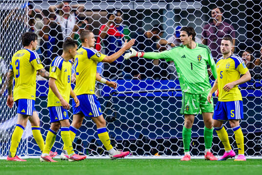 Gustaf Lagerbielke and goalkeeper Jacob Widell Zetterström