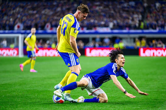 Viktor Gyökeres of Sweden and Ao Tanaka of Japan