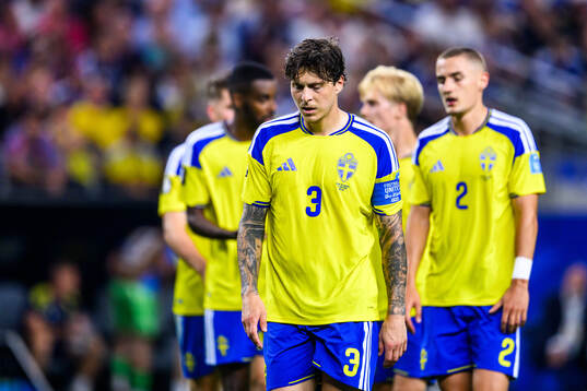 Victor Nilsson Lindelöf of Sweden looks dejected