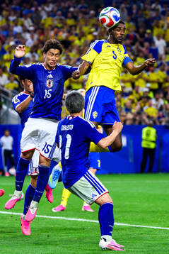 Daichi Kamada of Japan and Alexander Isak of Sweden