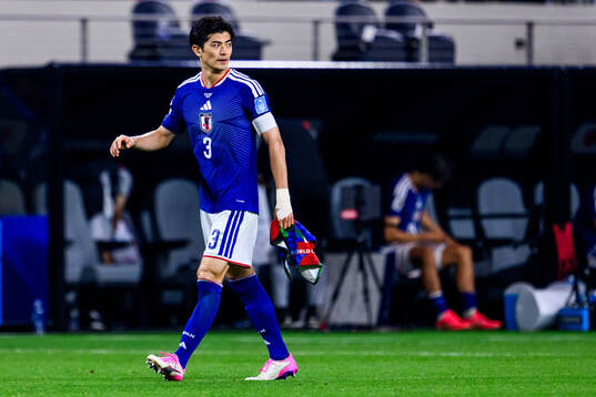 Shogo Taniguchi of Japan looks dejected