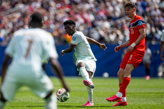 Aurelien Tchouameni of France and Jørgen Strand Larsen of