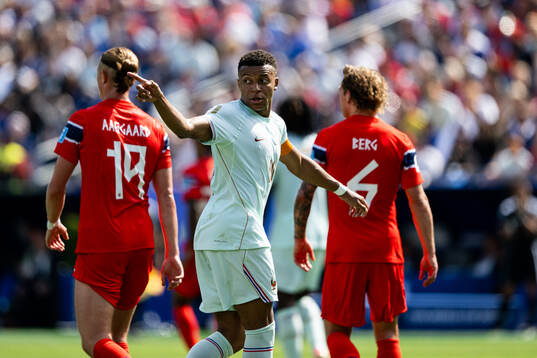 Thelo Aasgaard of Norway, Kylian Mbappe of France and