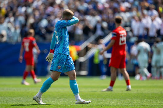 Goalkeeper Egil Selvik of Norway looks dejected