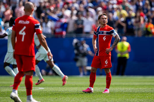 Patrick Berg of Norway looks dejected