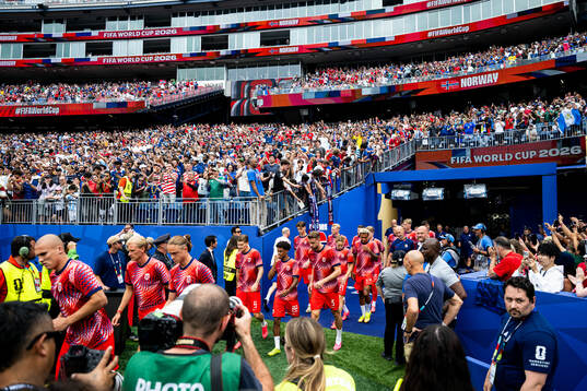 Players of Norway enters the pitch
