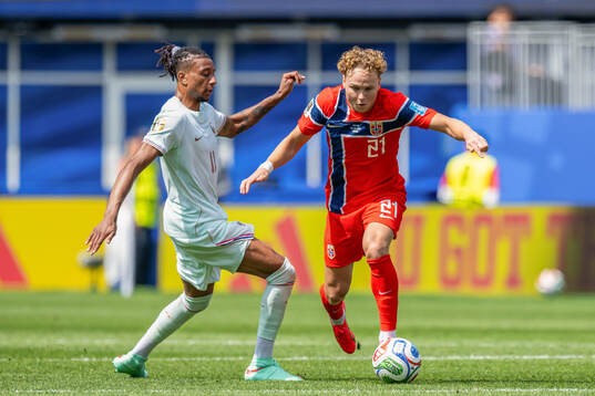 Michael Olise of France and Andreas Schjelderupof Norway