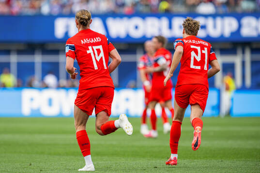 Thelo Aasgaard of Norway celebrates with teammate Andreas