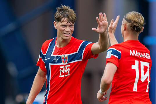 Thelo Aasgaard of Norway celebrates with teammate Henrik