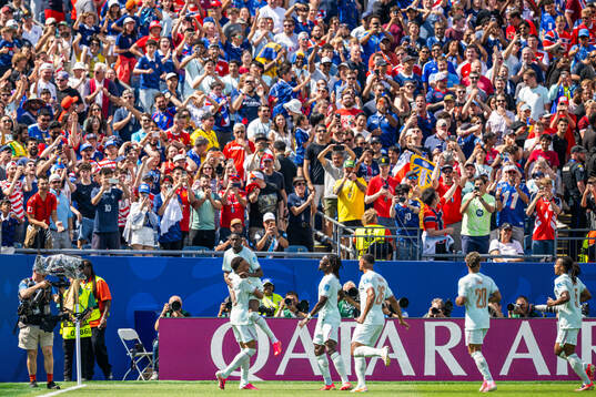 Ousmane Dembele of France celebrates with Kylian Mbappe and