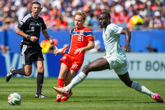 Andreas Schjelderup of Norway and Dayot Upamecano of France