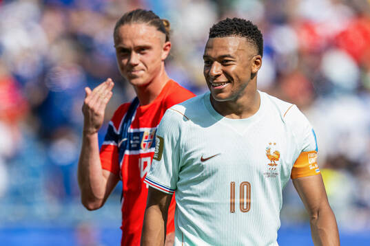 Thelo Aasgaard of Norway and Kylian Mbappe of France