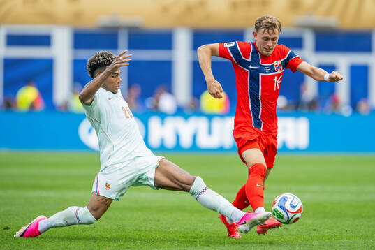 Desire Doue of France and Marcus Holmgren Pedersen of Norway