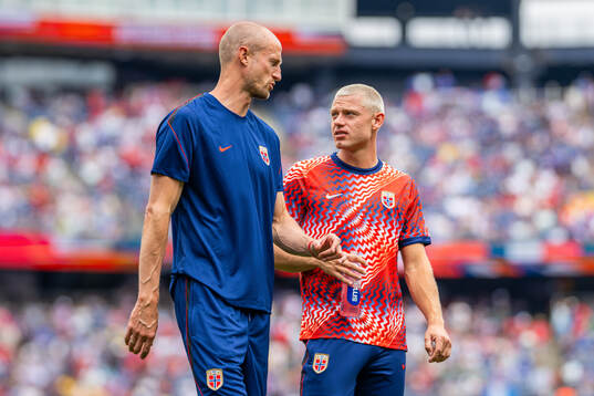 Brede Hangeland, player manager of Norway, and Julian