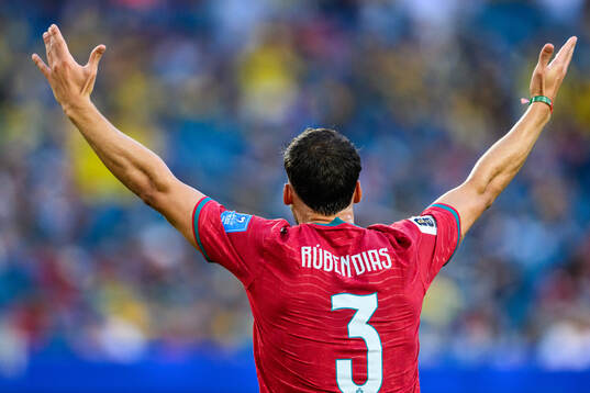 Ruben Dias of Portugal reacts