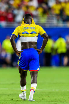 Deiver Machado of Colombia looks dejected