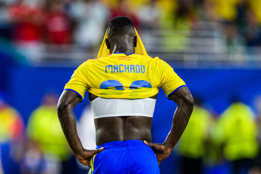 Deiver Machado of Colombia looks dejected