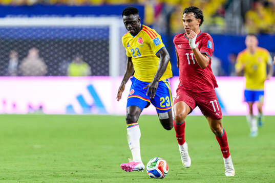 Davinson Sanchez of Colombia and Joao Felix of Portugal