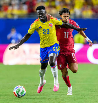 Davinson Sanchez of Colombia and Joao Felix of Portugal