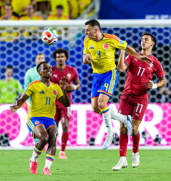 Jhon Arias and Santiago Arias of Colombia and Joao Felix of