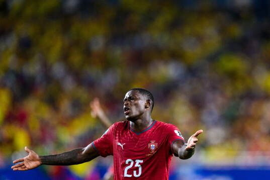 Nuno Mendes of Portugal reacts