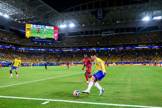 Rafael Leao of Portugal and Santiago Arias of Colombia