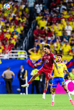 Samu Costa of Portugal and Luis Suarez of Colombia