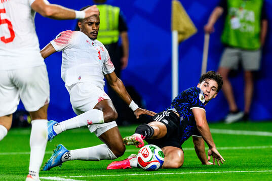 Abdallah Nasib of Jordan and Julian Alvarez of Argentina