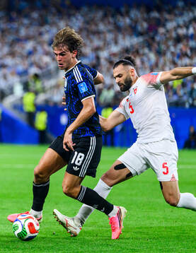 Nico Paz of Argentina and Yazan Alarab of Jordan