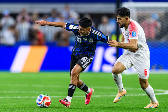 Thiago Almada of Argentina and Amer Jamous of Jordan